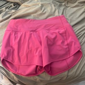 lululemon sonic pink sped ups 4 in